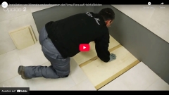 Einbauvideo von Mineralgussduschbecken auf Holzfußböden